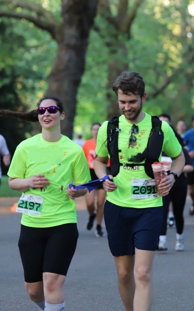 Image: Tanja running with her guide runner